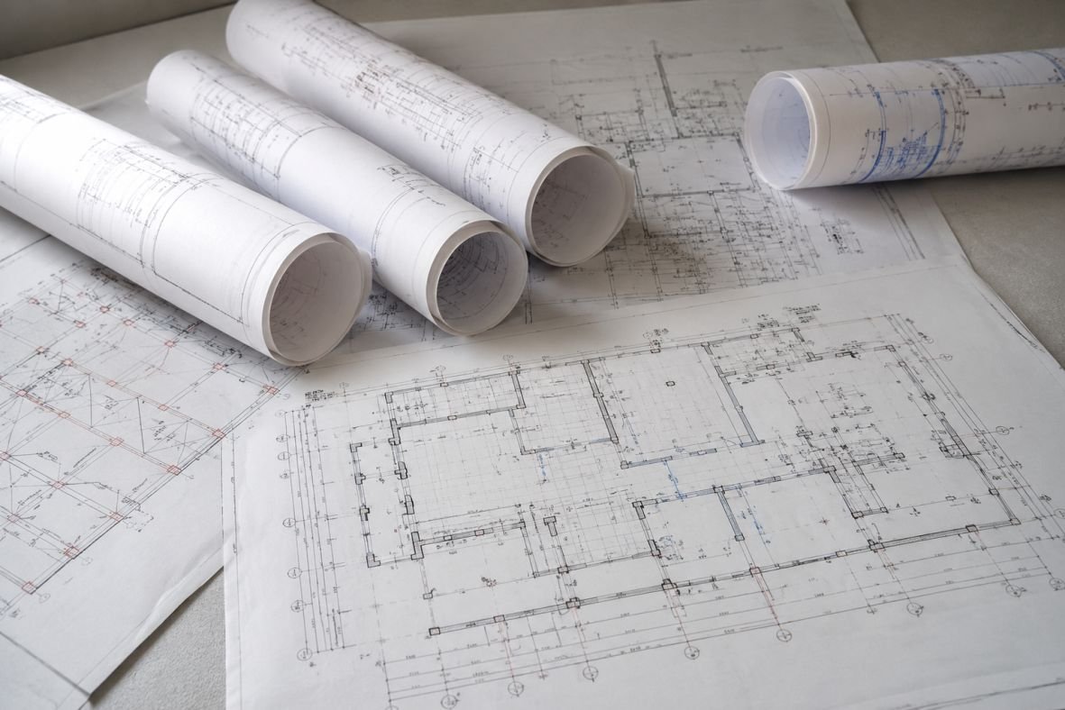 Projeto técnico sendo impresso em plotter na Ápice Digital